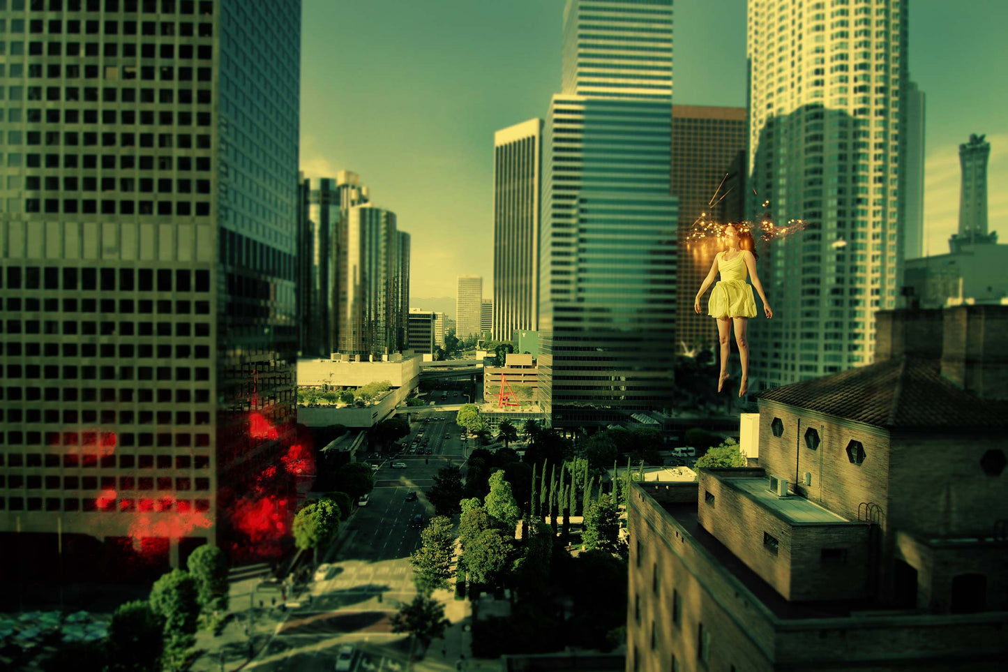 "Light Theory #2," is fine art photograph that showcases a surreal digital collage of a woman suspended in mid-air above downtown Los Angeles. This composition combines tones of green and yellow to create a dreamlike atmosphere where the architecture of the cityscape becomes an integral part of the narrative. Sparks of light punctuate the scene, infusing it with a sense of magic and intrigue.
